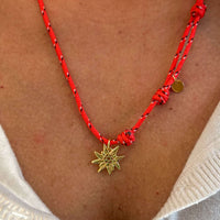 Collana Stella Alpina di luce – charm argento 925 placato oro